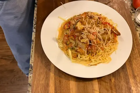 Set cooked pasta on a serving plate